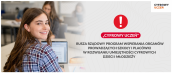 Plakat programu "Cyfrowy Uczeń" a na nim informacja: Rusza rządowy program wspierania organów prowadzących szkoły i placówki w rozwijaniu umiejętności cyfrowych dzieci i młodzieży.